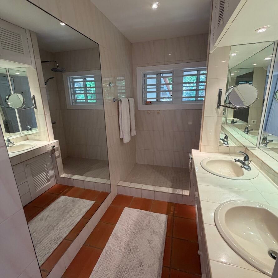 Private waterfront dock at Villa Coralita with views across Oyster Pond toward St. Barths.
