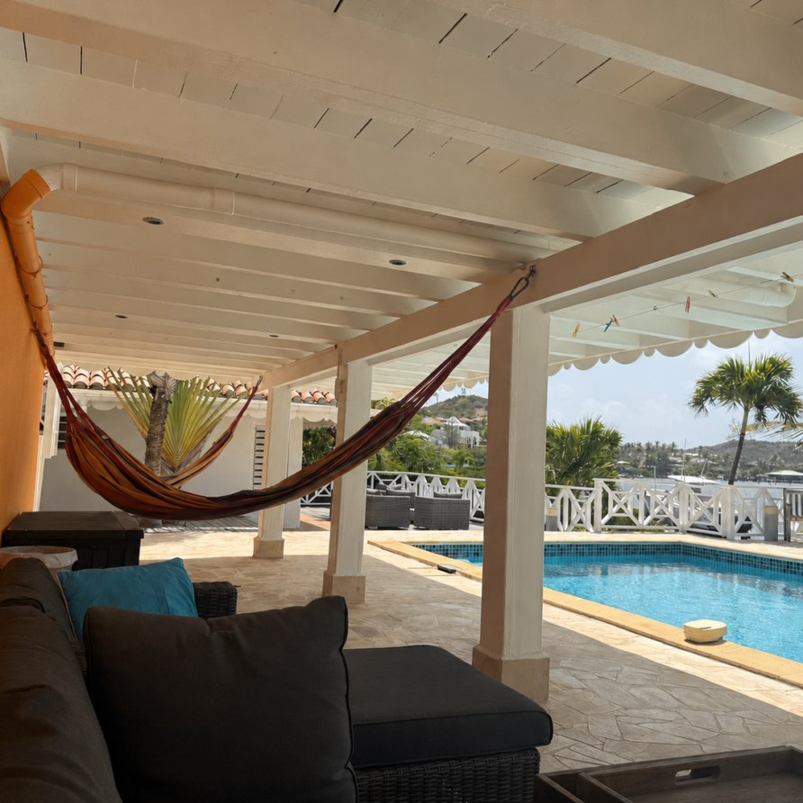 Villa Coralita overlooking the marina and Caribbean Sea in French Oyster Pond, St. Martin.