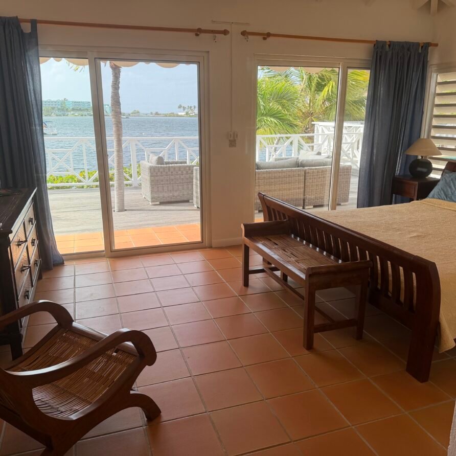 Waterfront villa in French Oyster Pond with panoramic Caribbean Sea and St. Barths views.
