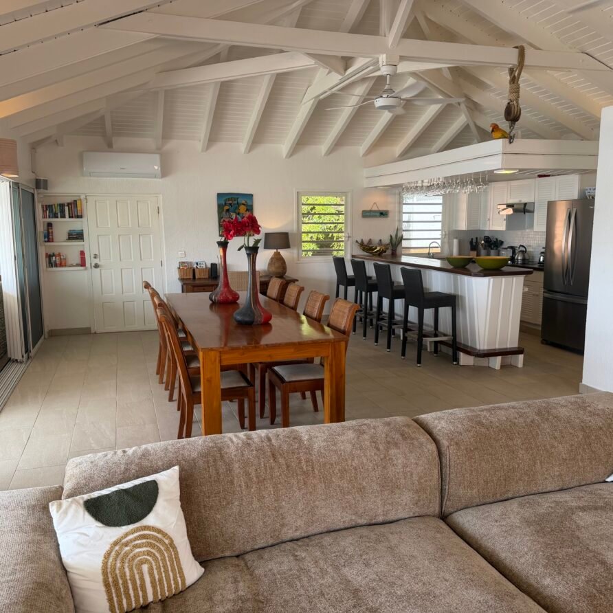 Waterfront villa in French Oyster Pond with panoramic Caribbean Sea and St. Barths views.