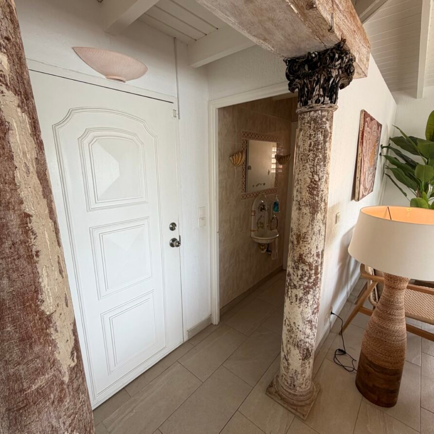 Private waterfront dock at Villa Coralita with views across Oyster Pond toward St. Barths.